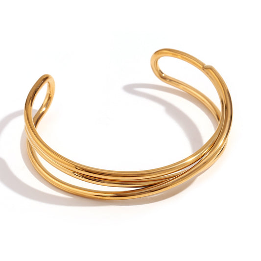  "Handmade Three-Layer Coiled Bracelet - Stylish Wrap-Around Jewelry with Intricate Twisted Detailing"